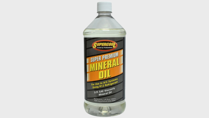 Two distinct oil cans: one labeled 