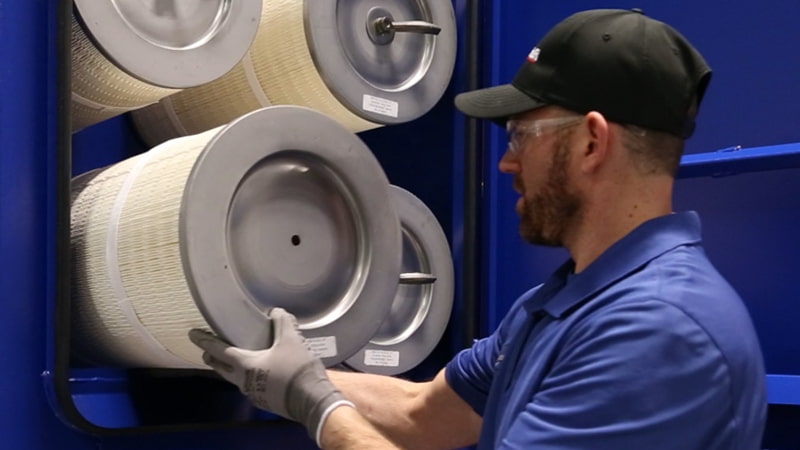 Technician Performing Proactive Filter Replacement